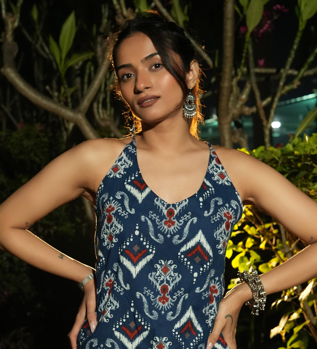 Woman wearing a Neel ikat kurta with jewelry in an outdoor setting